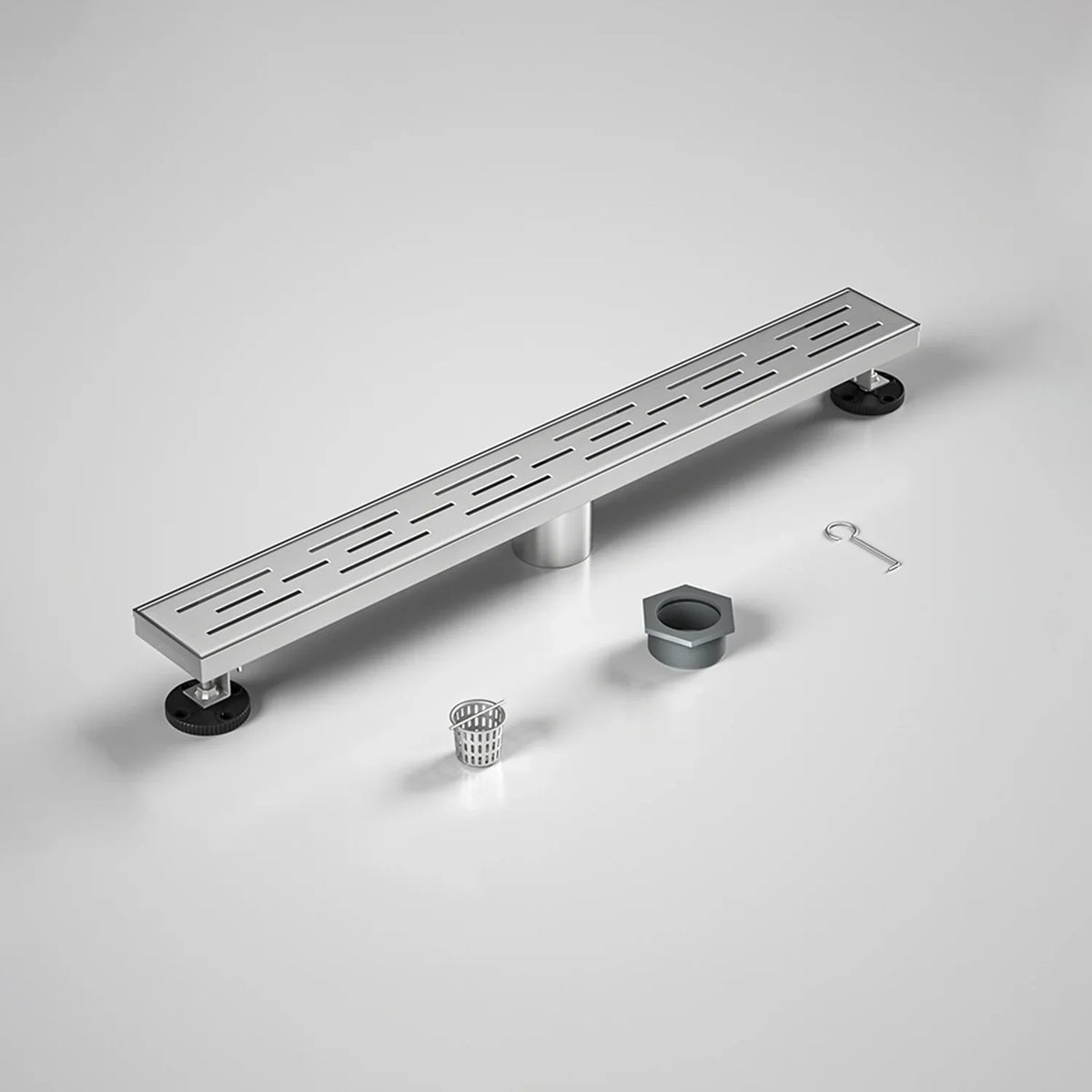 Stainless steel linear shower drain with installation parts on a white background