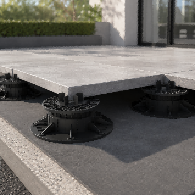 Adjustable pedestal system B-1 supporting 24x24 inch pavers on a rooftop deck installation