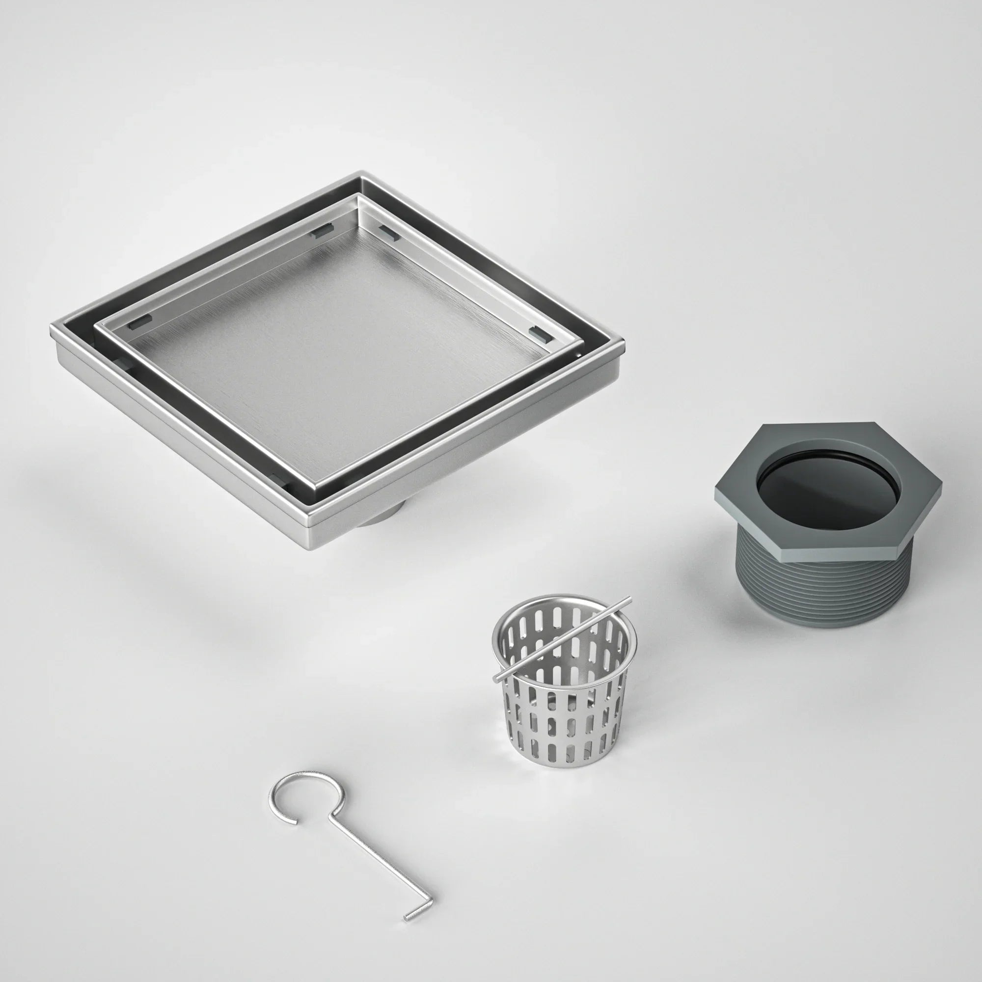 Square stainless steel floor drain kit with filter basket, wrench, and pipe fitting